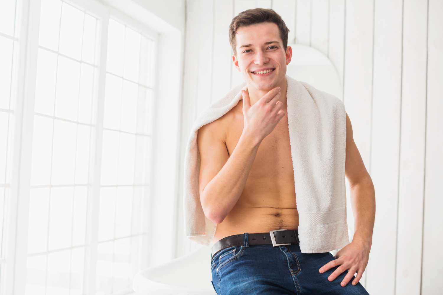 Man using towel for body skin